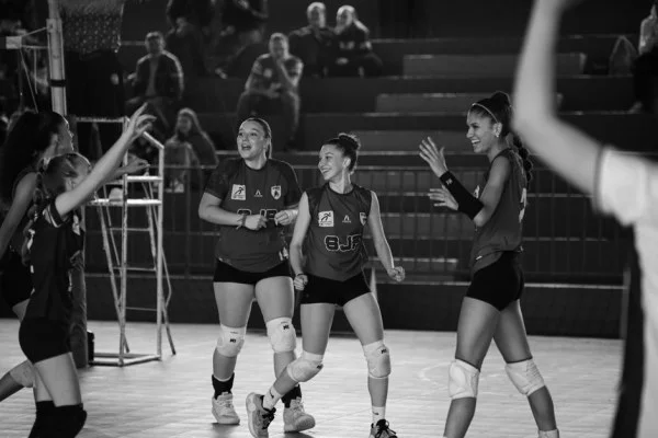 volleyball team celebrating